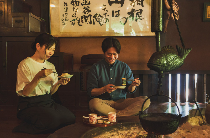 People eating rice cakes at an amazake tea house